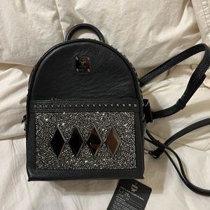 MCM mini backpack studded black